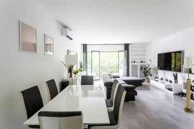 Coin salon dans l'établissement AV Experiences - Appartement Neuilly