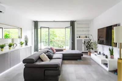 Coin salon dans l'établissement AV Experiences - Appartement Neuilly