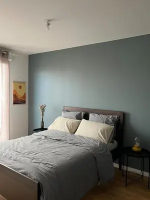 Un ou plusieurs lits dans un hébergement de l'établissement Cozy Flat in Saint Ouen