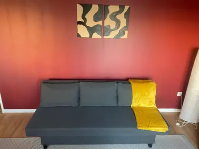 Coin salon dans l'établissement Cozy Flat in Saint Ouen