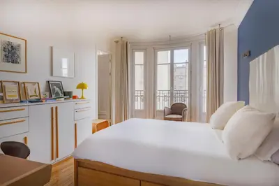 Un ou plusieurs lits dans un hébergement de l'établissement Paris Les Amandiers Residence