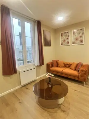 Coin salon dans l'établissement Le Nid de Clichy