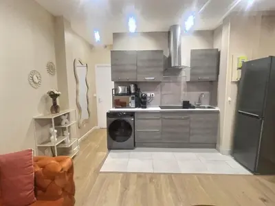 Cuisine ou kitchenette dans l'établissement Le Nid de Clichy