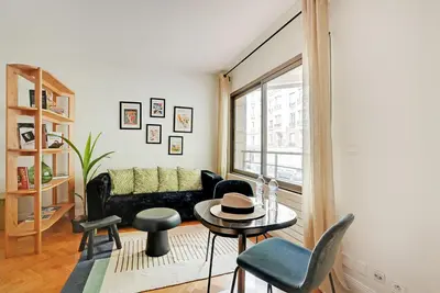 Coin salon dans l'établissement Charmant studio 30 m2 proche Hôpital américain