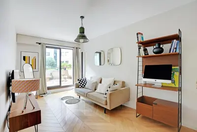 Coin salon dans l'établissement Appartement proche hôpital américain