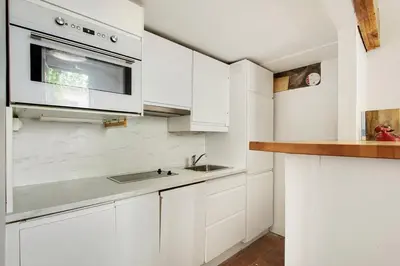Cuisine ou kitchenette dans l'établissement Loft avec terrasse au coeur du Marais