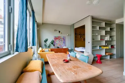 Coin salon dans l'établissement 1BR Flat with Balcony near the Eiffel Tower