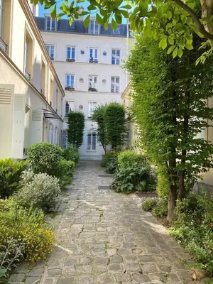 Jardin de l'établissement Quiet apartment in Paris center