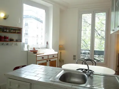 Cuisine ou kitchenette dans l'établissement Le Alesia