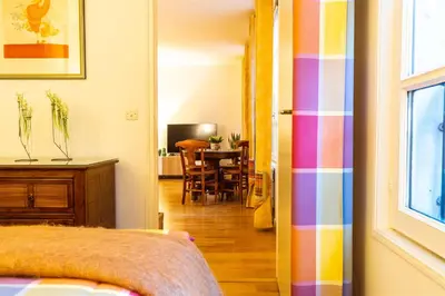 Télévision ou salle de divertissement dans l'établissement Le Daguerre
