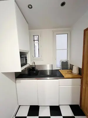 Cuisine ou kitchenette dans l'établissement Stylish and bright apartment 35m2 Paris 11ème