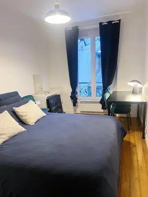Un ou plusieurs lits dans un hébergement de l'établissement Stylish and bright apartment 35m2 Paris 11ème