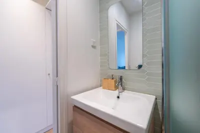 Salle de bains dans l'établissement Le Michelet - Studio - Proche Paris