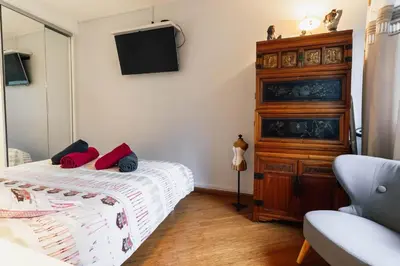 Un ou plusieurs lits dans un hébergement de l'établissement Le Rétro-Chic - T2 raffinée - Balcon & Métro M12