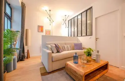 Coin salon dans l'établissement Perfect apartment - Marais II