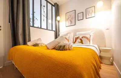 Un ou plusieurs lits dans un hébergement de l'établissement Perfect apartment - Marais II