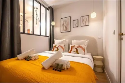 Un ou plusieurs lits dans un hébergement de l'établissement Perfect apartment - Marais II