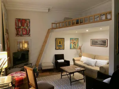 Coin salon dans l'établissement Eiffel Tower - Quiet, charming apartment - 2 prs