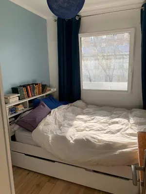 Un ou plusieurs lits dans un hébergement de l'établissement Sunny escape in Belleville