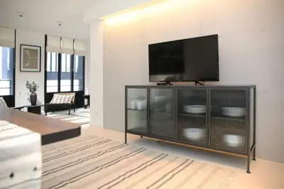 Télévision ou salle de divertissement dans l'établissement Elegance et confort pres du Marais Cosy - 4P