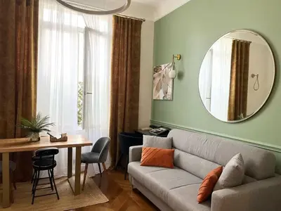 Coin salon dans l'établissement Appartement PARIS avec Parking