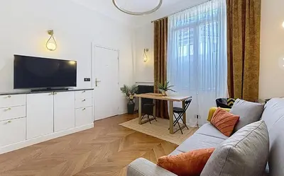 Télévision ou salle de divertissement dans l'établissement Appartement PARIS avec Parking