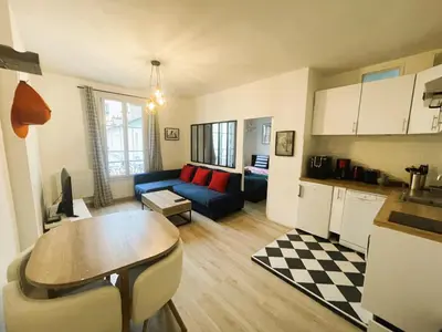 Cuisine ou kitchenette dans l'établissement Appartement sur cour quartier Olympiades
