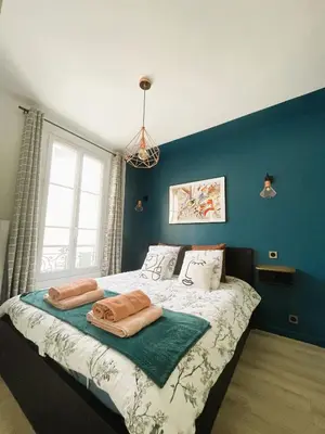 Un ou plusieurs lits dans un hébergement de l'établissement Appartement sur cour quartier Olympiades