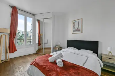 Un ou plusieurs lits dans un hébergement de l'établissement Veridian Apartment Métro Le Kremelin-Bicètre