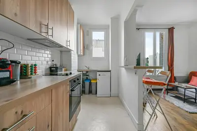 Cuisine ou kitchenette dans l'établissement Veridian Apartment Métro Le Kremelin-Bicètre