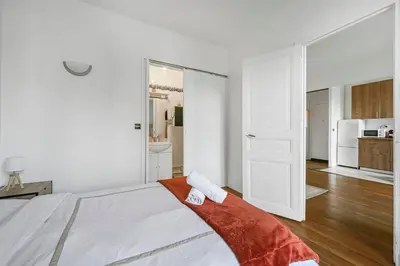 Un ou plusieurs lits dans un hébergement de l'établissement Veridian Apartment Métro Le Kremelin-Bicètre