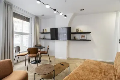 Télévision ou salle de divertissement dans l'établissement Appartement Design Parisien - Palais Maillot