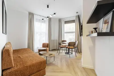 Coin salon dans l'établissement Appartement Design Parisien - Palais Maillot