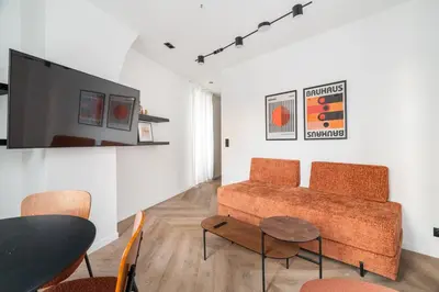 Coin salon dans l'établissement Appartement Design Parisien - Palais Maillot