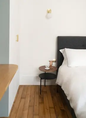 Un ou plusieurs lits dans un hébergement de l'établissement Minimalist Haussmannian Paris 11