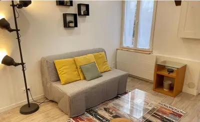 Coin salon dans l'établissement Apartment on Rue Morvan