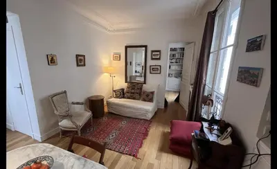 Coin salon dans l'établissement Bright apartment on Rue Ballu