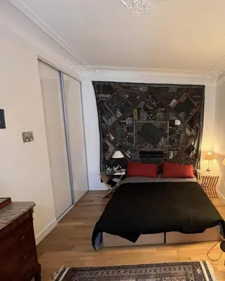Un ou plusieurs lits dans un hébergement de l'établissement Bright apartment on Rue Ballu