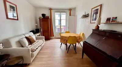Coin salon dans l'établissement Nid charmant et confortable