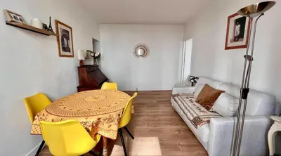Coin salon dans l'établissement Nid charmant et confortable