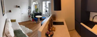 Un ou plusieurs lits dans un hébergement de l'établissement 2 pièces lumineux à deux pas de la Tour Eiffel