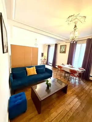 Coin salon dans l'établissement Appartement Tour Eiffel Chapu