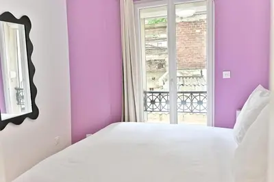Un ou plusieurs lits dans un hébergement de l'établissement Maisonette 5 minutes from Paris Levallois III