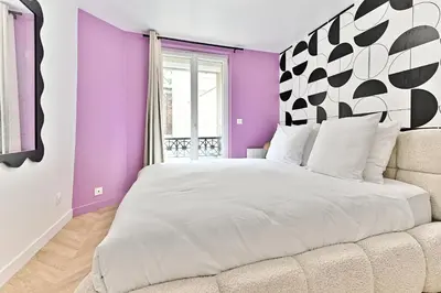 Un ou plusieurs lits dans un hébergement de l'établissement Maisonette 5 minutes from Paris Levallois III