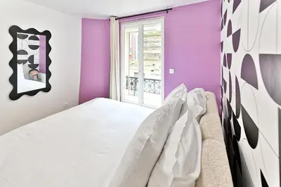 Un ou plusieurs lits dans un hébergement de l'établissement Maisonette 5 minutes from Paris Levallois III