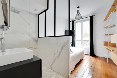 Un ou plusieurs lits dans un hébergement de l'établissement Duplex Loft Montmartre -18th