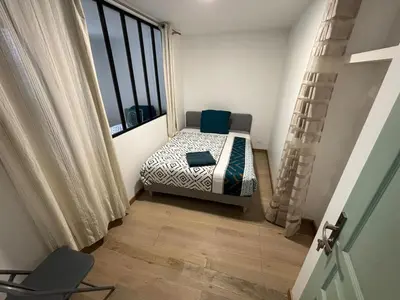 Un ou plusieurs lits dans un hébergement de l'établissement MX - House 10 min PARIS EXPOS- 11 bedrooms -