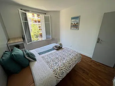 Un ou plusieurs lits dans un hébergement de l'établissement MX - House 10 min PARIS EXPOS- 11 bedrooms -