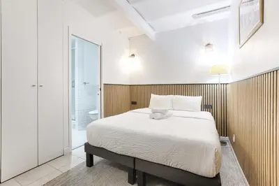 Un ou plusieurs lits dans un hébergement de l'établissement MyKeypers - Stylish & Luxury LOFT 6P - Arc de Triomphe