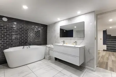 Salle de bains dans l'établissement MyKeypers - Amazing Luxury Triplex 3BR 8P - Arc de Triomphe